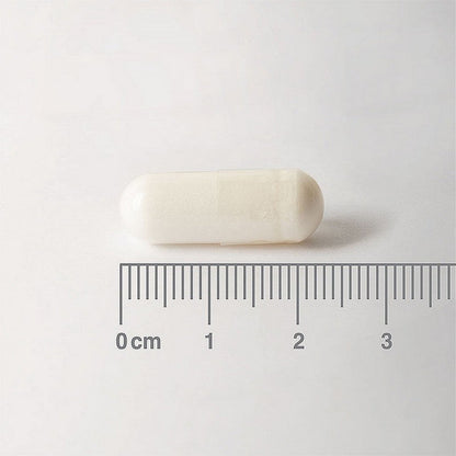 Bar of soap on a white background with a ruler for scale