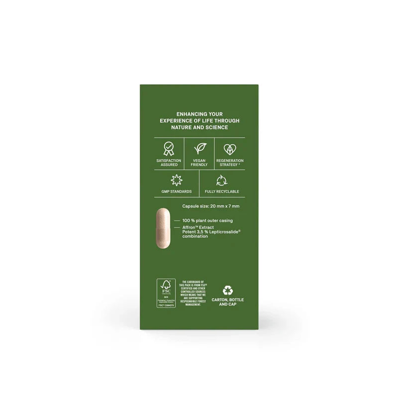A tall, narrow green product box shown upright on a clean white background. The front of the box features white text and icons, including a small photo of a beige capsule and claims such as plant-based, vegan, and recyclable.